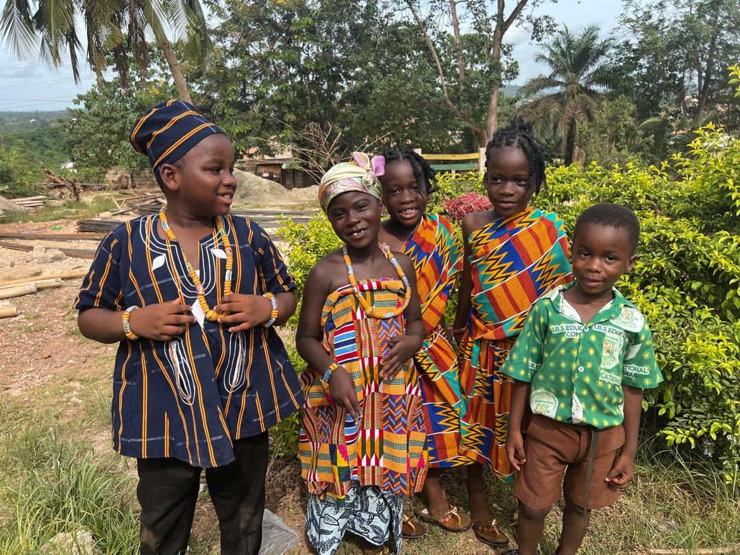 IBS pupils in traditional Ghanaian kente and batakari on cultural day